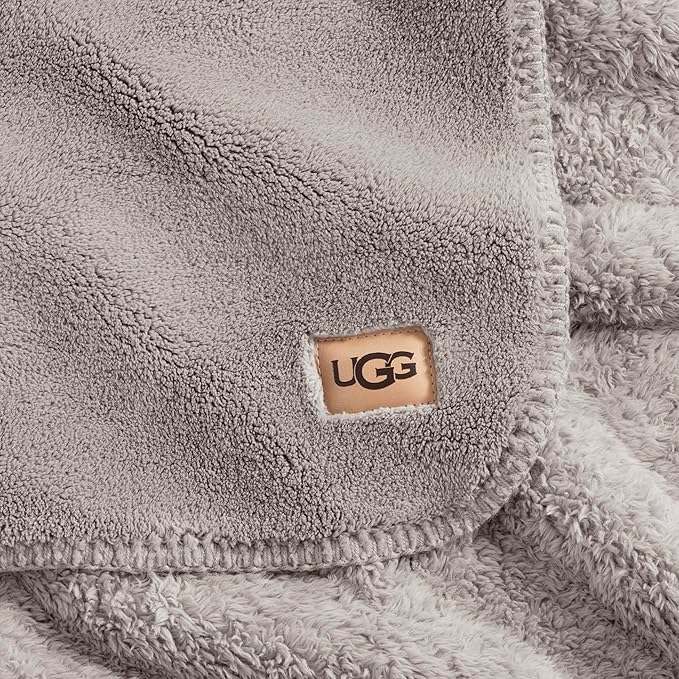 UGG Whitecap Plush Throw Blanket Fleece Lightweight Soft Throw for Couch or Bed Luxury Home Decor for Living Room Washable Hypoallergenic Blankets for Dorm Decor, 50-inch x 70-inch, Light Grey Seal