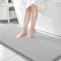 OLANLY Thick Memory Foam Bath Mat Rug 70x24, Extra Soft Absorbent Bathroom Rug, Quick Dry Bath Mats, Non-Slip, Machine Washable Carpet for Bathroom, Tub and Shower, Home Decor Accessories, Light Grey